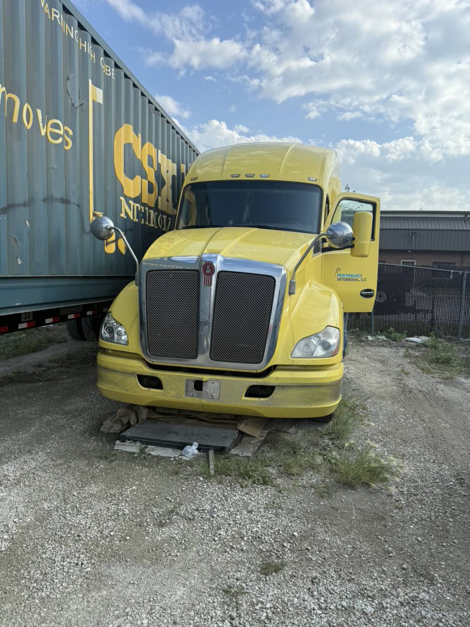 Kenworth T680 Passenger RH Lower Sleeper Extension Fairing 2013 Yellow Used - donor truck front view; listed part only