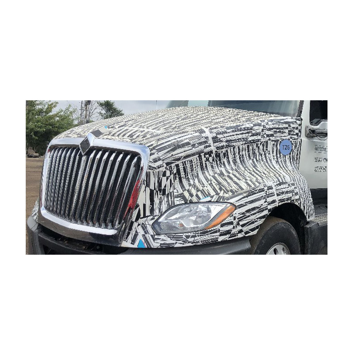 International LT625 Hood Hinge Bar Used